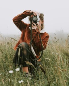 photo of woman taking photo