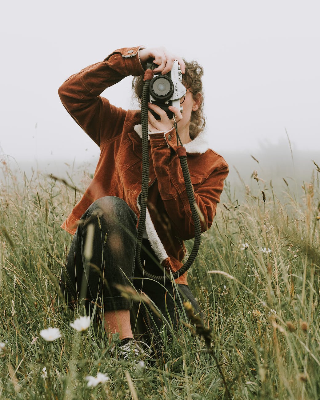 photo of woman taking photo